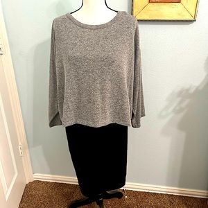 Dress that was never warn. attached jacket over black mini dress.